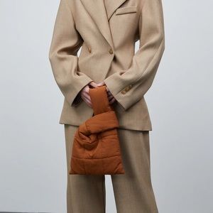 Mini puffer clutch bag from “SourceUnknown.com”